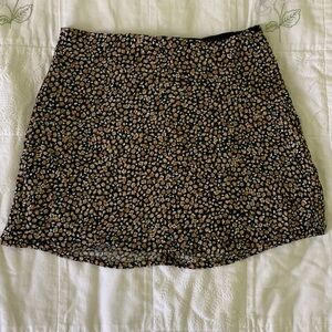 Garage mini skirt, brown/black floral, A-line. Small, zipper back.